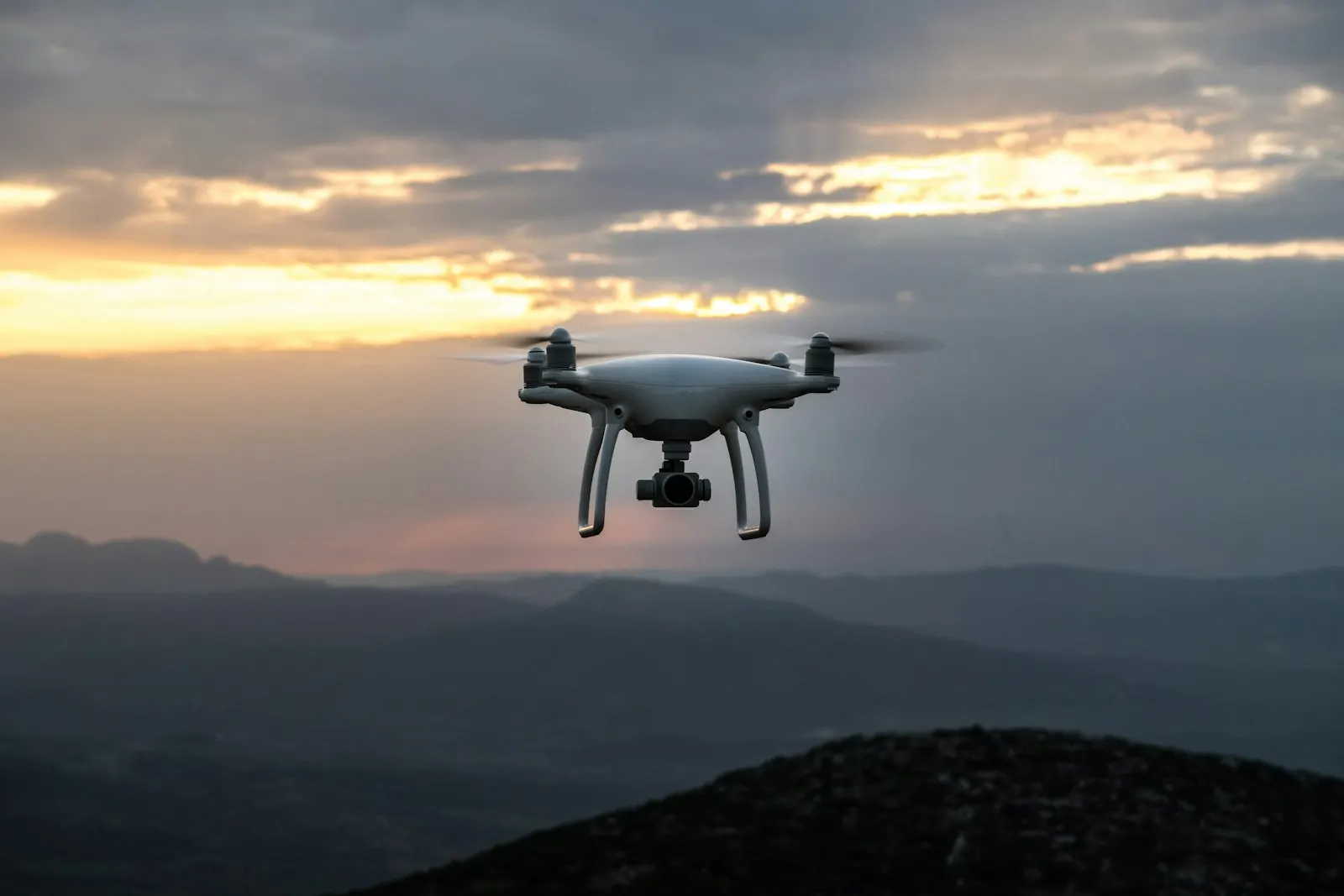 Drone hovering at dusk