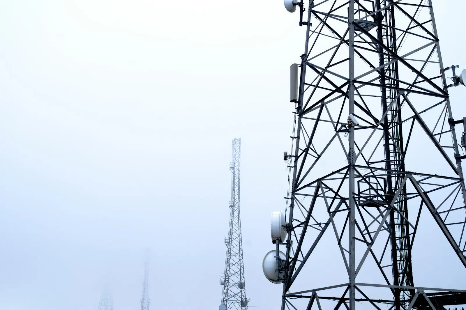 Telecommunications tower in fog